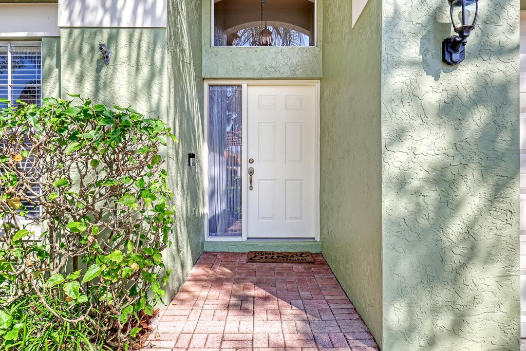 Photo of 5014 Elpine Way, Riviera Beach, FL 33418 (MLS # R10959850)