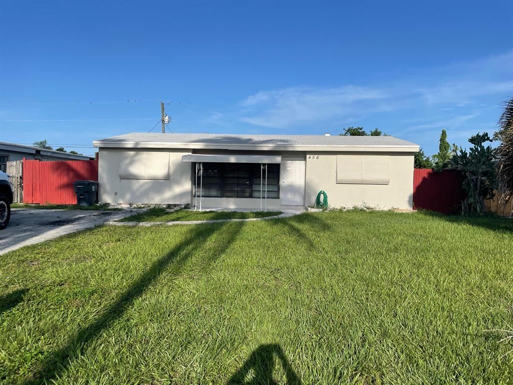 Photo of 456 Waseca Drive Dr, Lake Worth Beach, FL 33462 (MLS # R10736523)