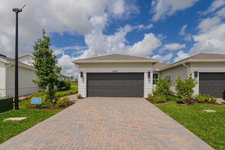 Beautiful Never lived in New Villa (Spring Lake IV Model) in fabulous 55+ community, Four Seasons at Wylder, gated community just minutes from Golf, dining & entertainment. Features 3 BR's, 2 BA's, 2 Car Garage & Screen Enclosed Lanai with Garden View. Stunning chef's kitchen with quartz waterfall countertops, large island, hood, Wall oven, Stainless steel appliances, premium cabinetry & contemporary open-concept layout is perfect for entertaining. Sleek tile flooring throughout, smart-home technology and high-end finishes that elevate your everyday living. Thoughtfully designed for comfort and convenience. Amenities coming soon offering Audubon club (clubhouse) fitness, pool, cabanas, outdoor spa, pickleball courts & more. Luxury Living at affordable price! Just in Phase 1 more to come.