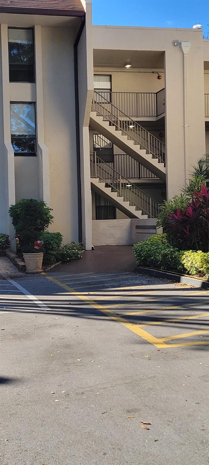 This move-in-ready 55+ community condo at Concord Village Condominiums is nestled in the sought-after Tamarac area! Just a few minutes from restaurants, shops, and major highways, this immaculately well-maintained unit features newer appliances, laminate wood floorings throughout, and a spacious bedroom with a walk-in closet, living room, and dining room combo. Washer and Dryer hook up if you prefer not to use the community laundry. This unit also features a welcoming screened-in patio overlooking serene gardens. This condo is truly a gem!