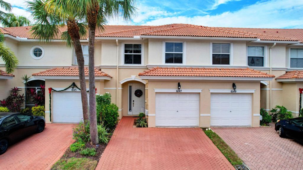 Photo of 6147 Seminole Gardens Circle, Riviera Beach, FL 33418 (MLS # R10938581)