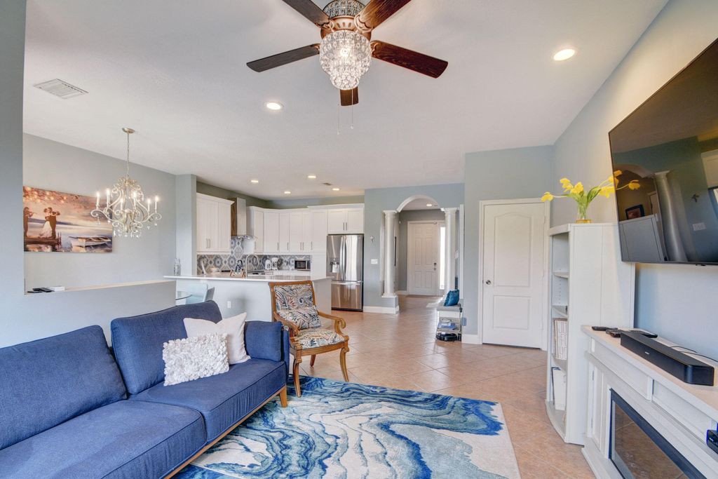 Photo of 6147 Seminole Gardens Circle, Riviera Beach, FL 33418 (MLS # R10938581)