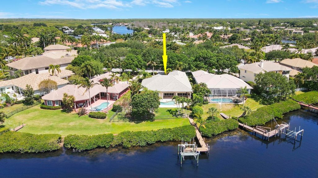 Photo of 8841 SE Compass Island Way, Jupiter, FL 33458 (MLS # R10982037)