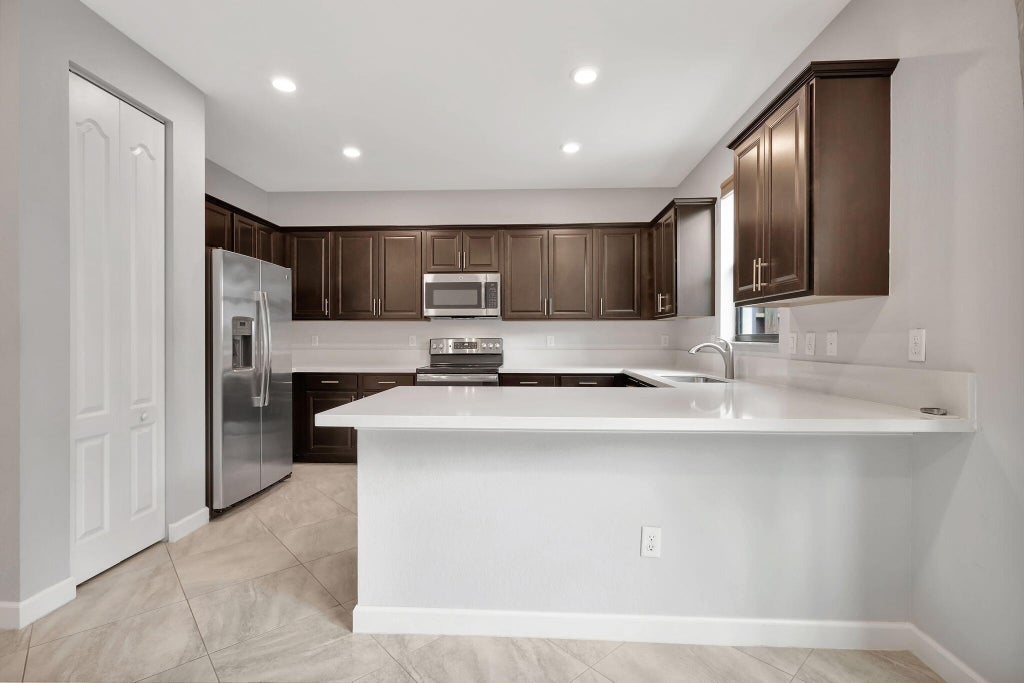 Photo of 12950 ANTHORNE Lane, Boynton Beach, FL 33436 (MLS # B26074844)