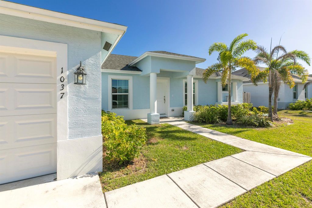 Photo of 1037 SE Lansdowne Avenue, Port Saint Lucie, FL 34983 (MLS # R10974833)