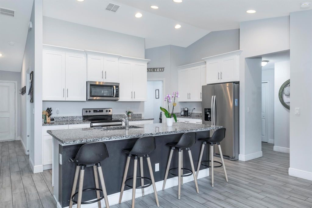 Photo of 1037 SE Lansdowne Avenue, Port Saint Lucie, FL 34983 (MLS # R10974833)