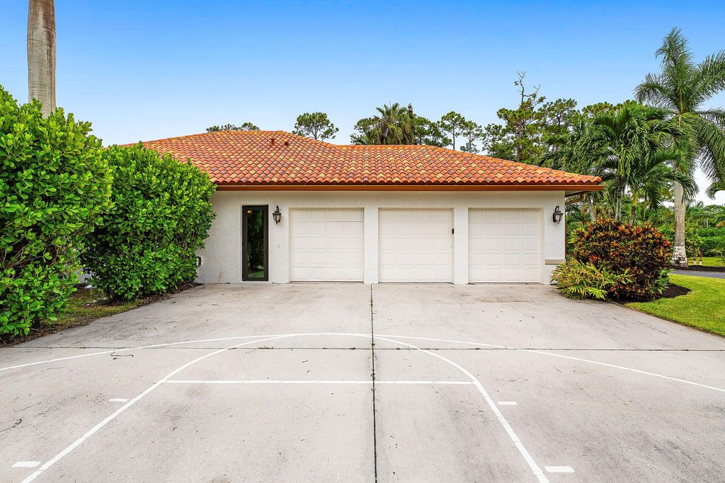 Photo of 11516 Hawk Hollow, Lake Worth, FL 33449 (MLS # R11112096)