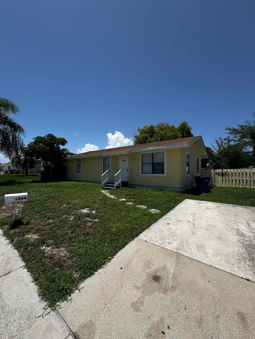 Photo of 1464 W 32nd Street, Riviera Beach, FL 33404 (MLS # B26046916)