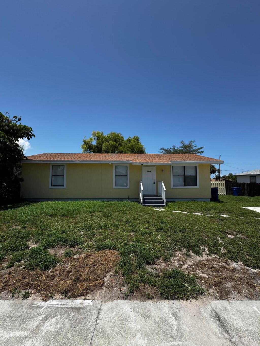 Photo of 1464 W 32nd Street, Riviera Beach, FL 33404 (MLS # B26046916)