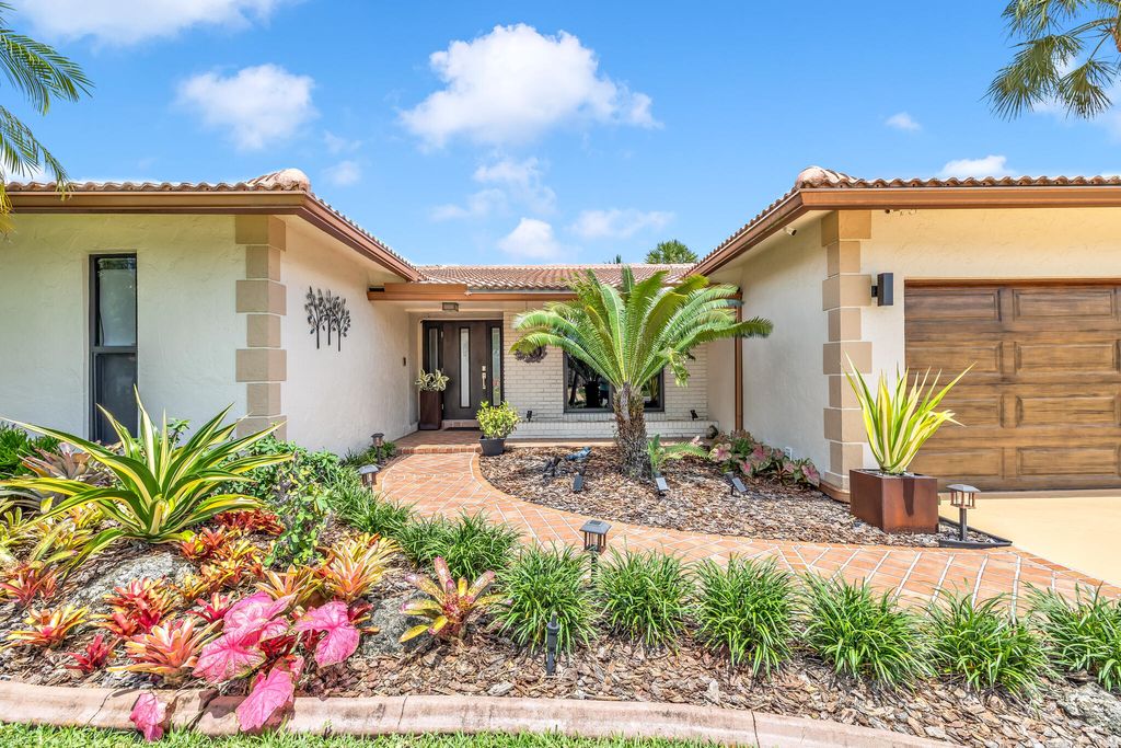 Photo of 1779 NW 88th Way, Coral Springs, FL 33071 (MLS # B26035386)