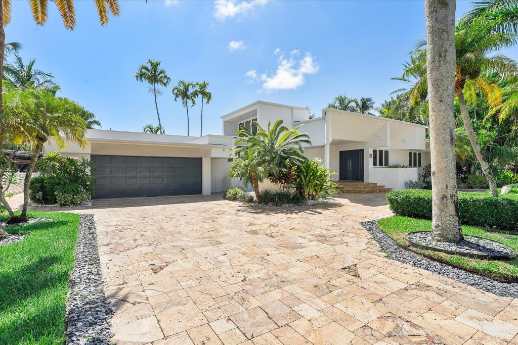 Photo of 18 Nurmi Drive, Fort Lauderdale, FL 33301 (MLS # B26071491)