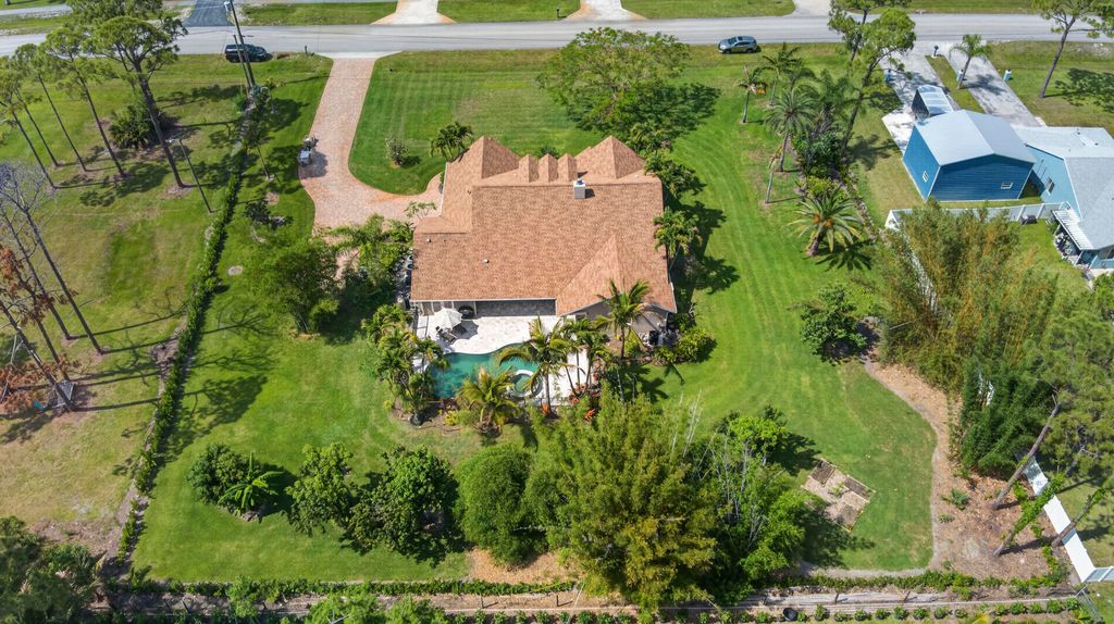 Photo of 12632 Citrus Grove Boulevard, West Palm Beach, FL 33412 (MLS # B26020401)