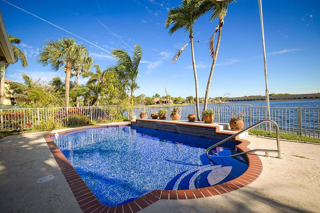Photo of 10260 NW 60th Place, Parkland, FL 33076 (MLS # R11104468)