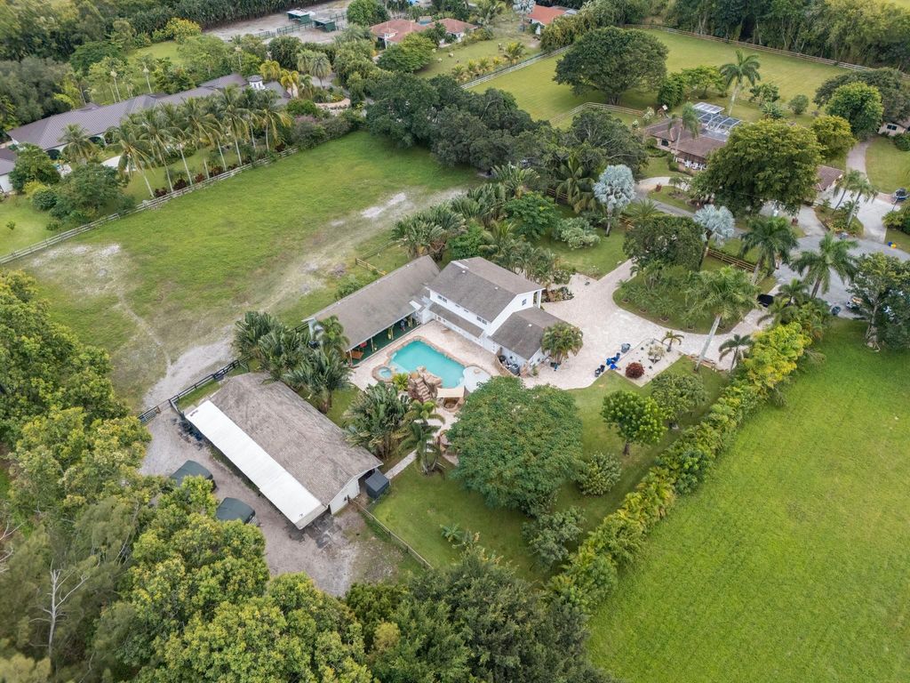 Photo of 8233 Stagecoach Ln, Boca Raton, FL 33496 (MLS # F10541201)