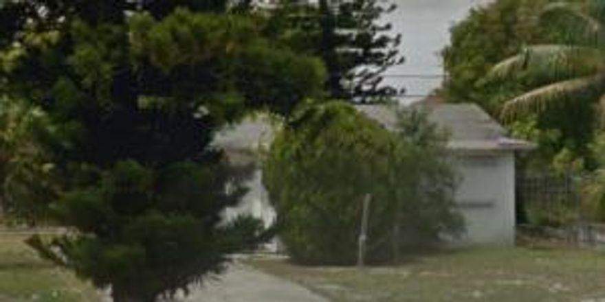 Investment opportunity or home for small family. Room to enlarge house. Vacant and boarded up until further notice. Drive By to see Property. Four unit apartment building contiguous to the south, 124 SW 8th Ave., also available for sale.