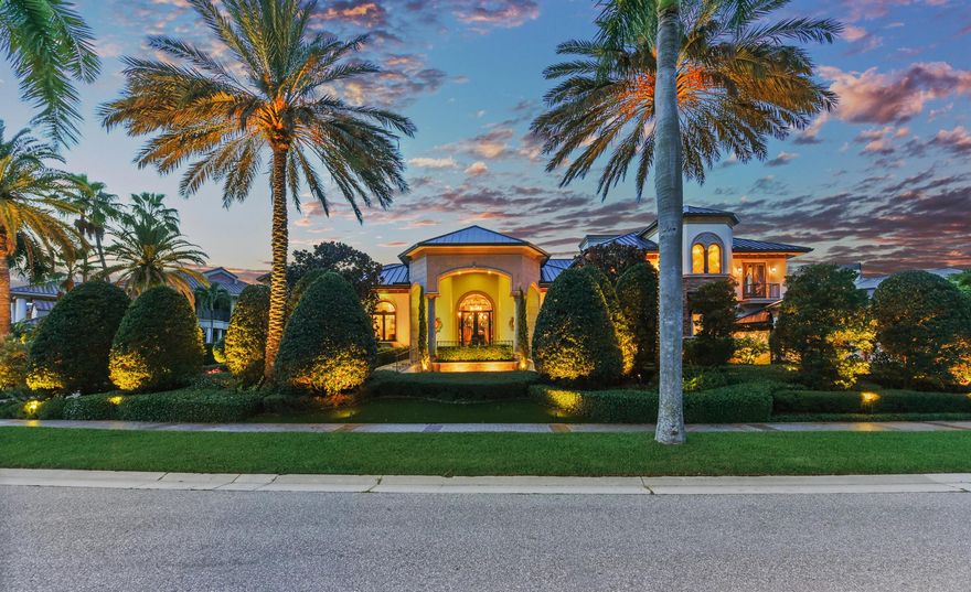 This prestigious estate in St Andrews Country Club, with 5 bedrooms, 6.1 bathrooms and 6,904 living square feet, had an expansion and complete ground-up renovation in 2012 with the world's finest materials and workmanship. Beautiful hand carved woodwork, gold leafed coffers, Venetian plaster and extensive use of stained glass provide amazing attention to details. The stunning living room features a one-of-a-kind Italian light fixture and a custom designed fireplace and mantle. A Gentlemen's club room with custom built onyx bar, the chef's kitchen with Viking range and twin 48'' Sub-Zero refrigerators, and family room with built in wall unit all are designed for effortless entertaining or casual living. The master wing includes a grand master suite with generous his and her high-end