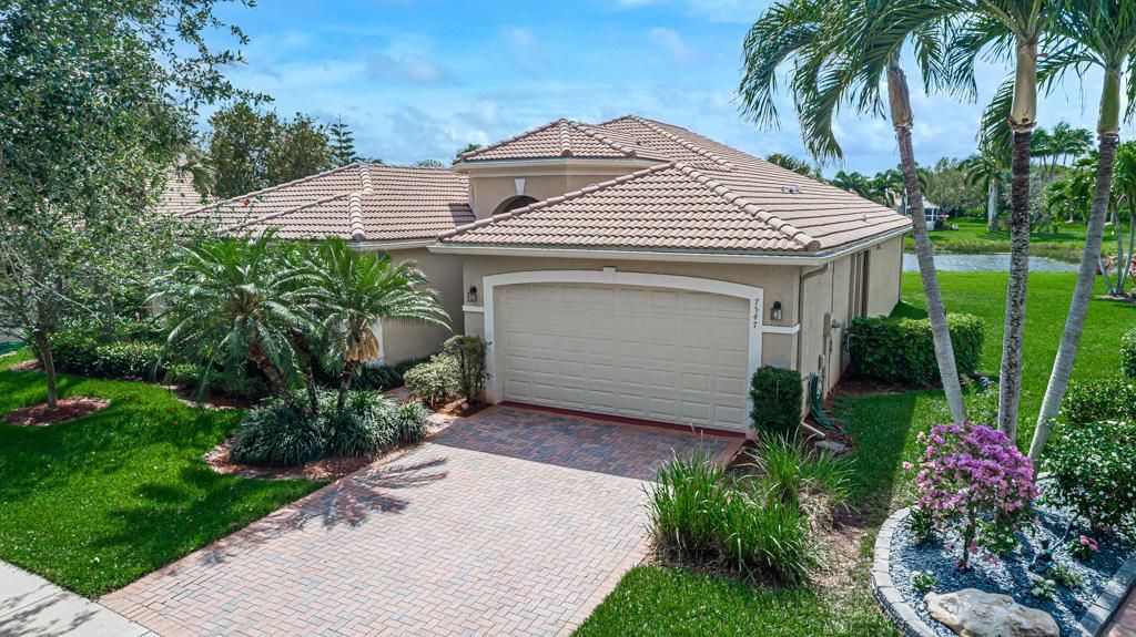 Photo of 7547 Tarpon Cove Circle Cir, Lake Worth Beach, FL 33467 (MLS # R10711540)