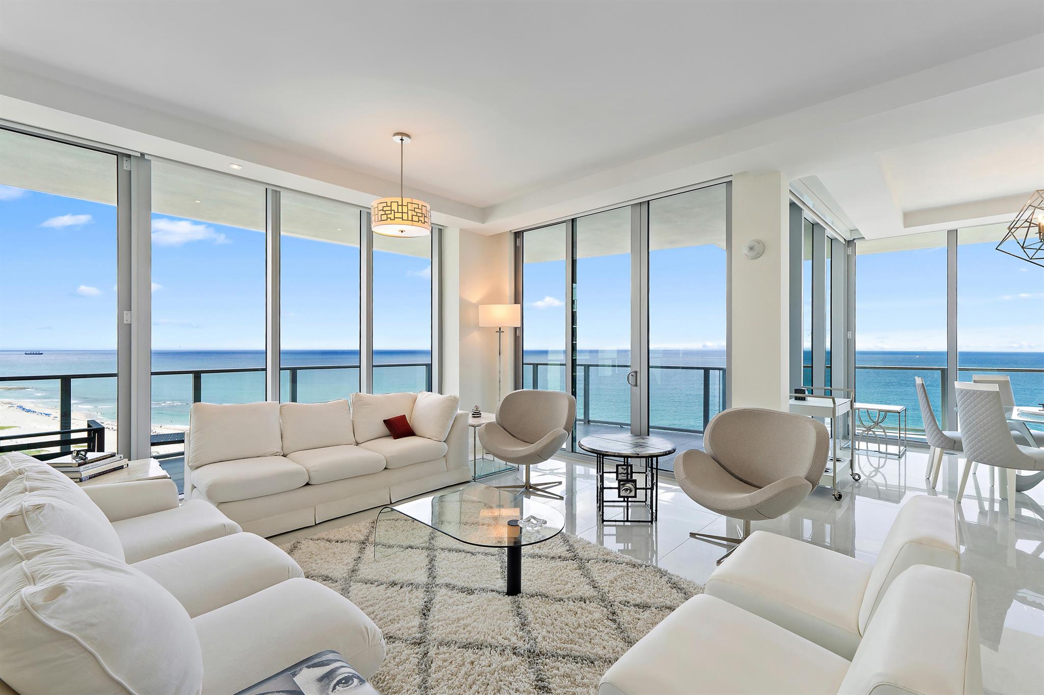 Luxury awaits steps from the sand at Amrit, a brand-new health and wellness focused community on Singer Island. Fully furnished, this 2,655sf, 2 bed, 2.5 bath residence offers breathtaking panoramic ocean views from the moment you step inside. Floor-to-ceiling impact sliders lead to an expansive terrace, from which ocean views abound. The gourmet European kitchen is appointed with premium Miele appliances, quartz countertops, wine fridge, and full wet bar. Amrit residents enjoy first class amenities; beachfront cabana service, two oceanfront pools, hot tubs, yoga terrace, and a full-service spa including cutting-edge wellness amenities.Resort-style living is redefined at Amrit Ocean Resort, where amenities include four on-site restaurants, 24-hour security, valet parking,