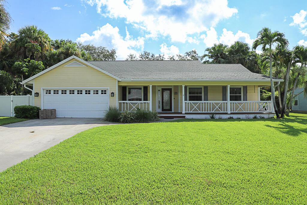 Beautiful 3 bedroom, 2 bath, 2 car garage, POOL home on a corner lot located in Vero Beach. This home features a spacious layout, woodburning fireplace, vaulted ceilings, eat in kitchen and an office/den. Enjoy the large screened in, newly resurfaced pool area with all new pool pumps/equipment. The front porch has been upgraded with new mahogany floors and beautiful tongue and groove ceilings. Quite street with low HOA dues and close to shops, restaurants, and grocery stores.