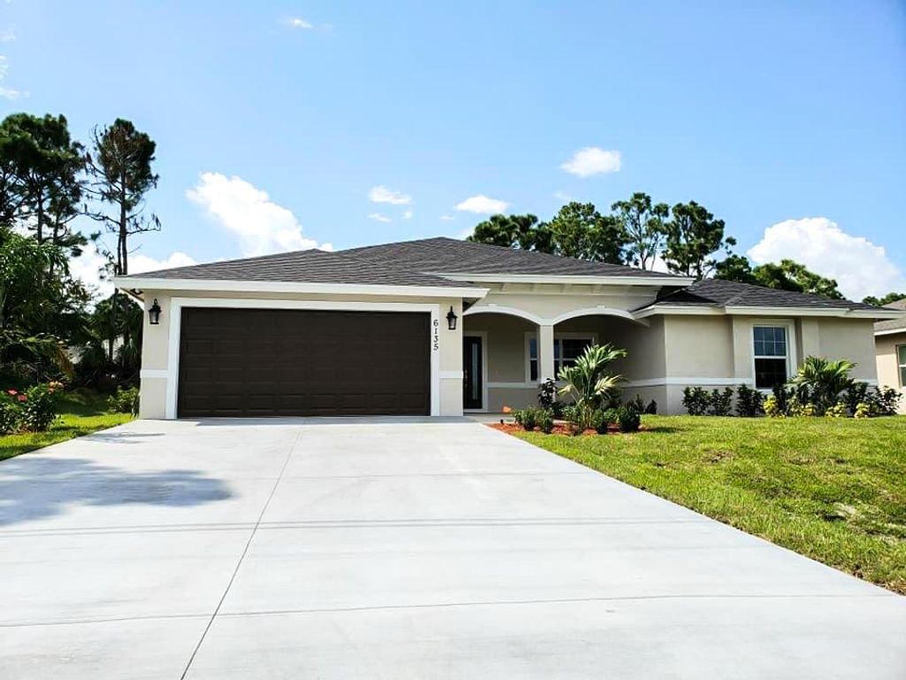 Photo of 5996 NW Baynard Drive Dr, Port St Lucie, FL 34986 (MLS # R10648472)