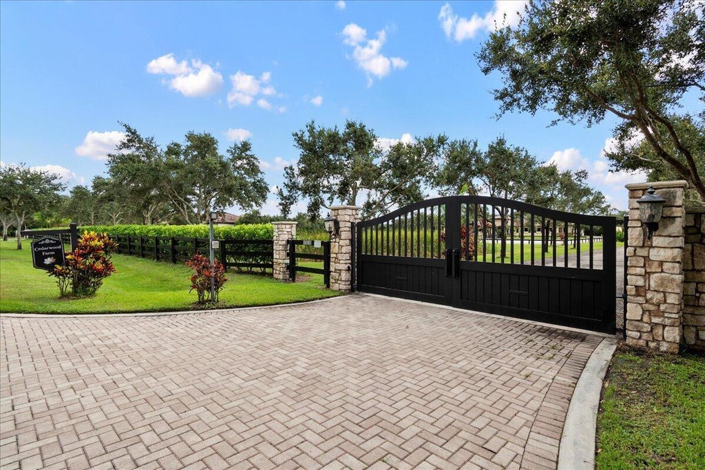 Photo of 15636 Sunnyland Lane, Wellington, FL 33414 (MLS # B26082336)