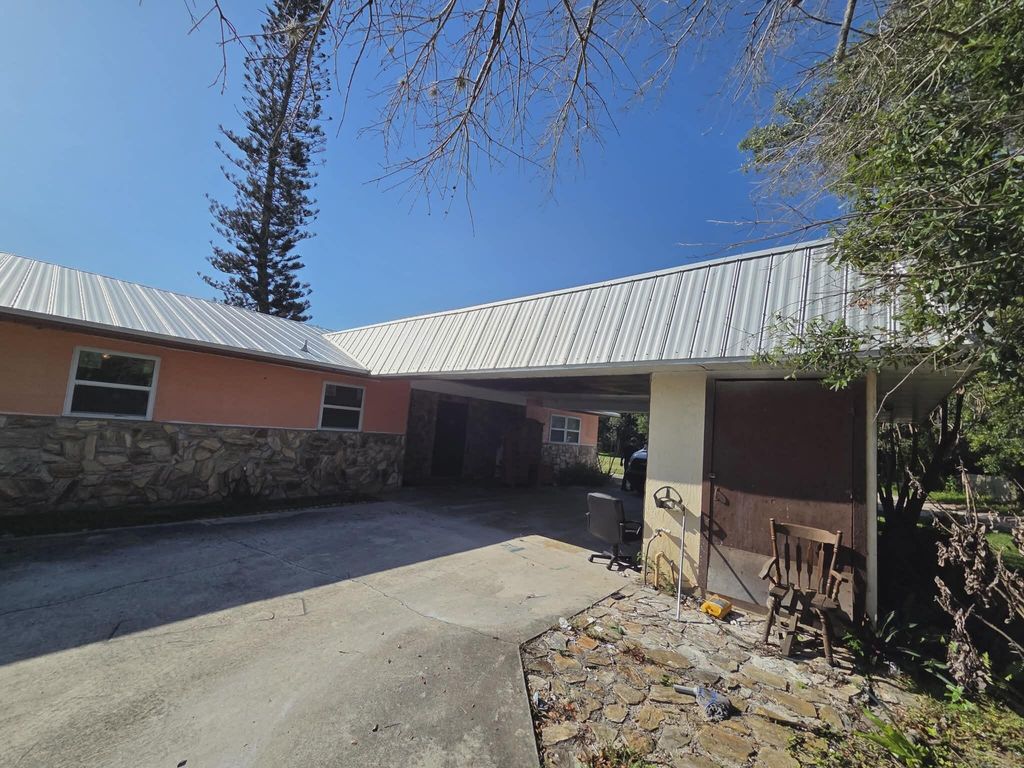 Photo of 5959 Peterson Road, Fort Pierce, FL 34947 (MLS # B26043727)