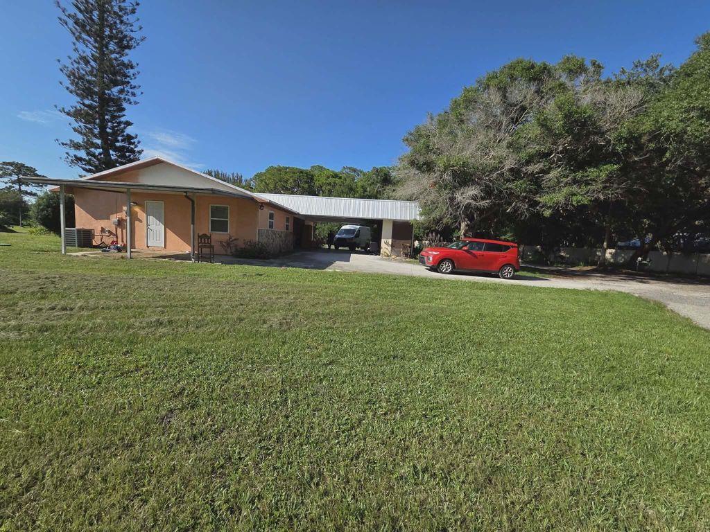 Photo of 5959 Peterson Road, Fort Pierce, FL 34947 (MLS # B26043727)