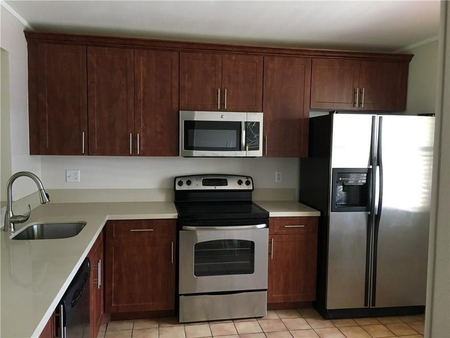 BEAUTIFUL 2 STORY TOWNHOUSE WITH AMAZING LAKE VIEWS. UPGRATED UNIT WITH NEW KITCHEN, QUARTZ COUNTERTOP, SS APPLIANCES, NEW AC, CROWN MOLDINGS AND TILES ON FIRST FLOOR. NEW CARPET, NEW "SPA" VANATIES AND WALK-IN CLOSETS IN THE BEDROOMS. CHARMING PORCH OVERLOOKING THE LAKE. FRESHLY PAINTED. LOCATED IN THE HEART OF BOCA RATON BY THE YMCA, A RATED SCHOOLS AND NEW RETAIL. DON'T MISS THIS OPPORTUNITY TO OWN IN THIS GREAT HIDDEN BOCA GEM!!!