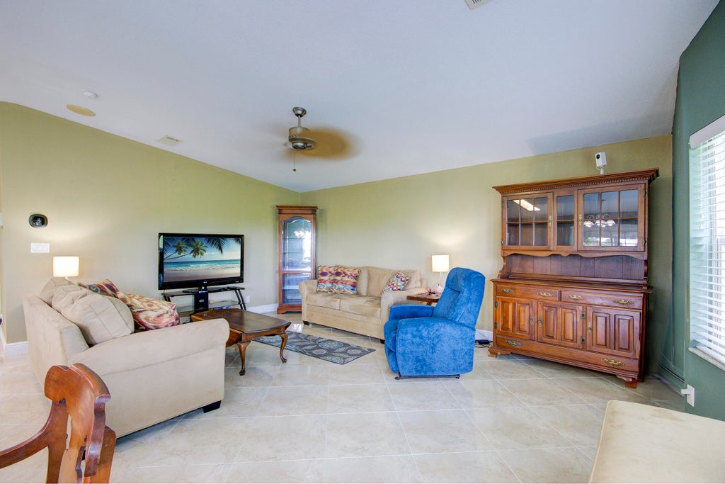 Photo of 8133 9th Hole Drive, Port Saint Lucie, FL 34952 (MLS # R11017135)