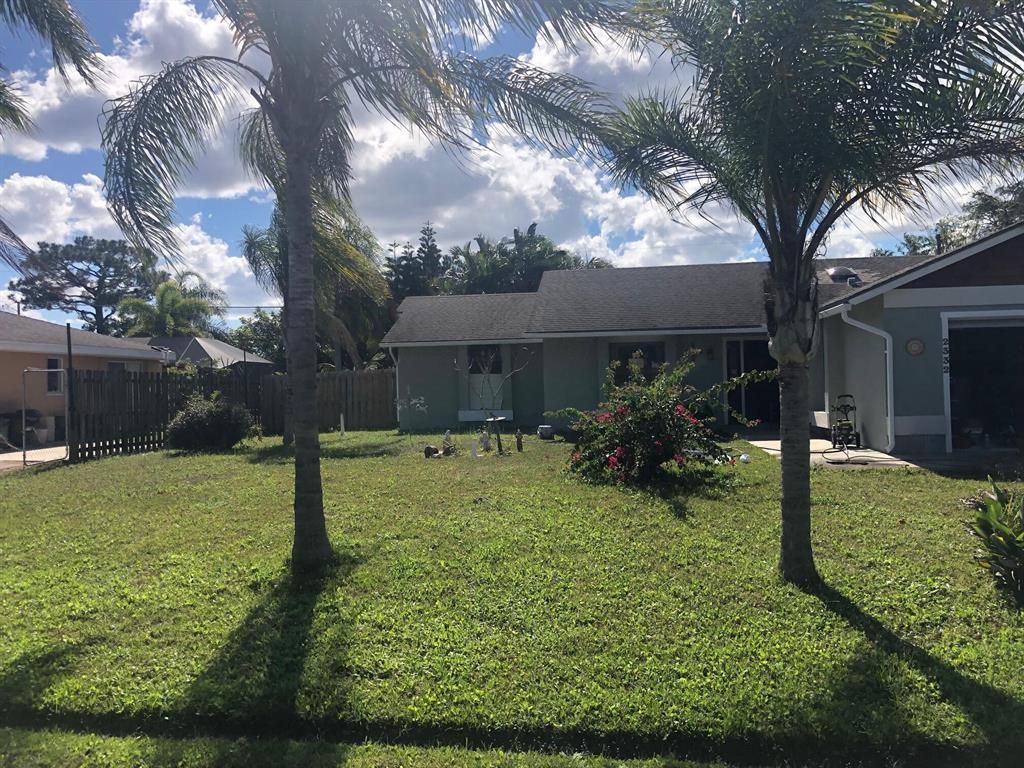 Photo of 2332 SE Holland Street, Port Saint Lucie, FL 34952 (MLS # R10781465)