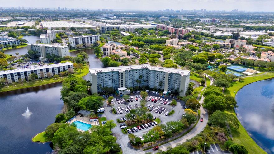 Stunning, fully renovated bright and airy  2 Bedroom 2 Bathroom Penthouse condo unit in highly desirable Cypress Bend - Enjoy sunrise views from the patio while overlooking the expansive lake and fountain. Fabulous chef's kitchen with quartz countertops, wood cabinets, breakfast bar, and coffee station. Freshly painted 2024, New Roof 2023, Approximately 1340 sq feet of living area in this gorgeous condo with 3 ceiling fans, electric smoke detectors.  Full hurricane protection with impact windows and accordions on patio. Extremely well managed community offers 3 pools, hot tub, tennis courts, pickleball, 2 clubhouses, gym, walking path, storage and more. Parking space 111