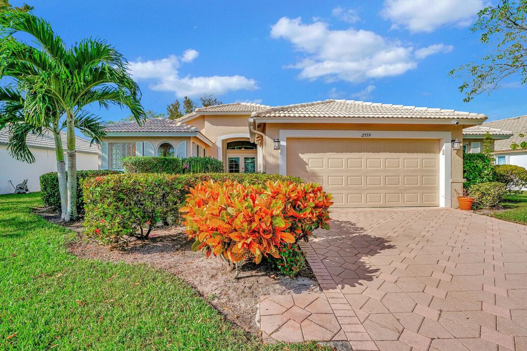 Photo of 2559 Egret Lake Drive, Greenacres, FL 33413 (MLS # R10934969)