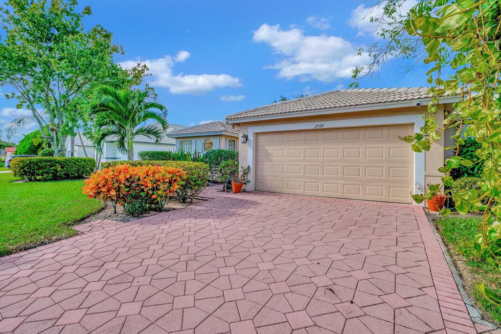 Photo of 2559 Egret Lake Drive, Greenacres, FL 33413 (MLS # R10934969)