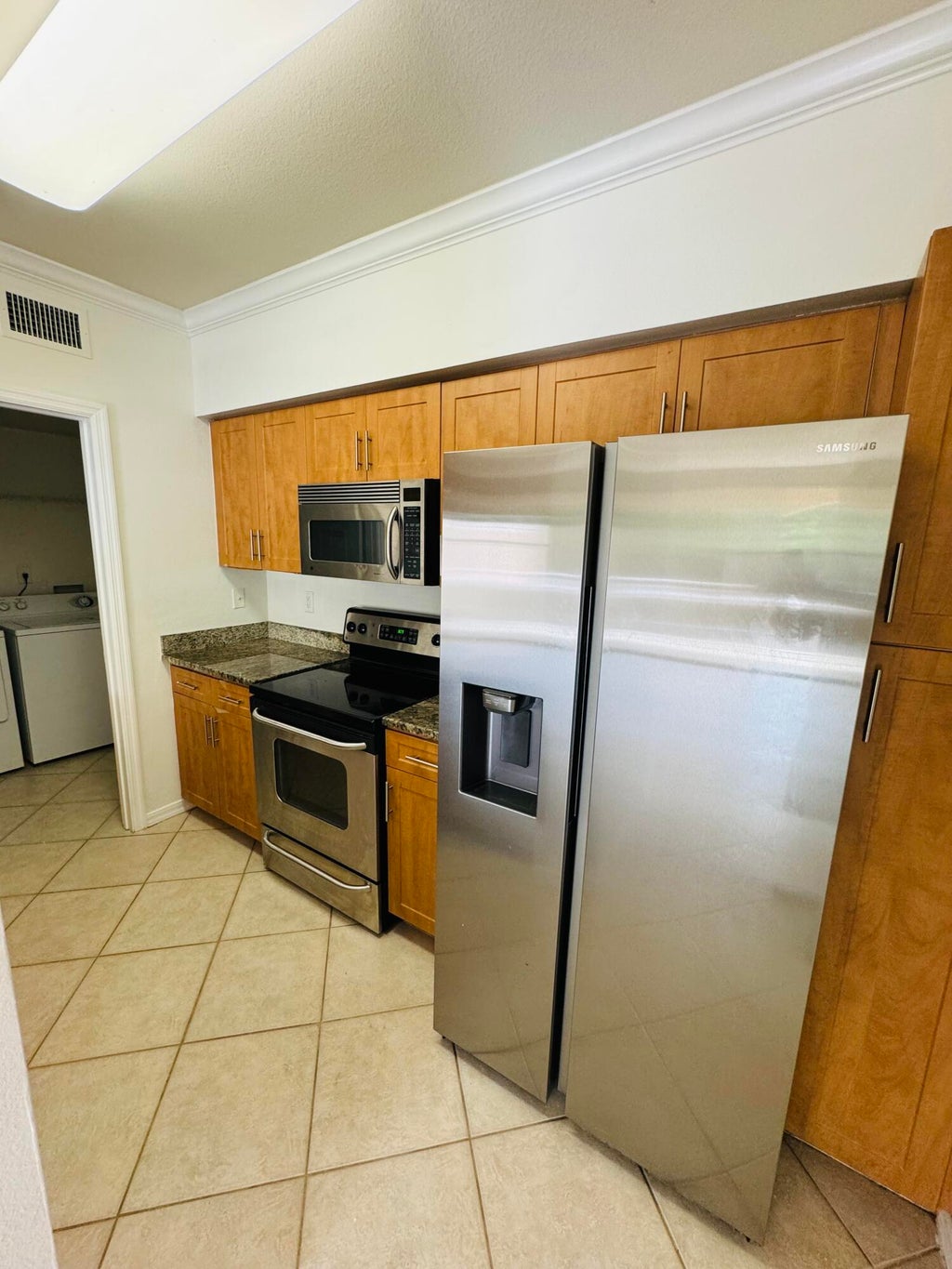 Photo of 6394 EMERALD DUNES Drive #202, West Palm Beach, FL 33411 (MLS # B26065981)