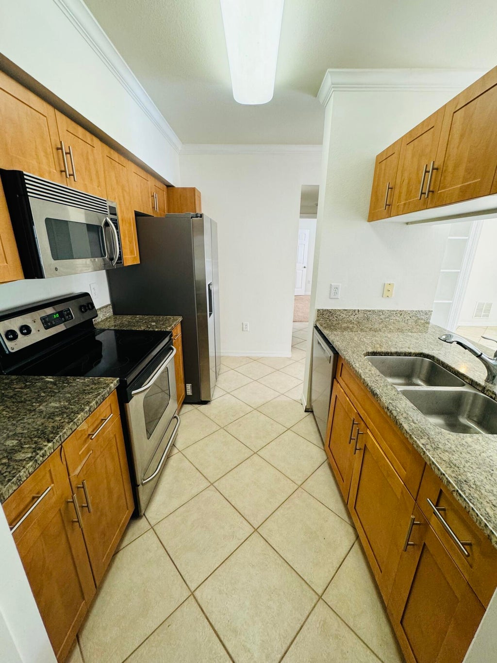 Photo of 6394 EMERALD DUNES Drive #202, West Palm Beach, FL 33411 (MLS # B26065981)