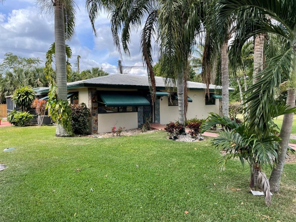 Photo of 1732 Boardman Avenue, West Palm Beach, FL 33407 (MLS # R10706748)