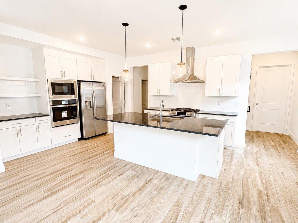 Photo of 10075 Dreamweaver Road, Port Saint Lucie, FL 34987 (MLS # B26064369)