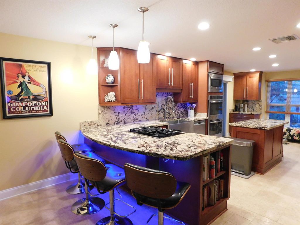 Photo of 11943 Butternut Street, Palm Beach Gardens, FL 33410 (MLS # R11139518)