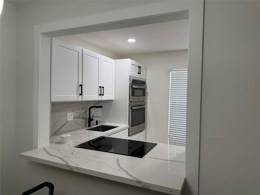 Welcome to this stunning Fully renovated 1 bed/1bath condo in the desirable Bermuda Club community! This move in ready home features a bright, open layout with brand new luxury flooring, modern kitchen with stainless steel appliances and stylish finishes throughout. The beautifully upgraded bathroom shines with gold accents. Enjoy morning coffee or evening sunsets on your private screened balcony, perfect for relaxation and added living space. New lighting, fixtures and finishing touches throughout make this unit stand out from the rest. Active 55 + community with pools, clubhouse, fitness center, tennis and more. Conveniently located near shopping, restaurants, medical facilities and major highways. Association requires 675 + credit score. A must-see, won’t last long!