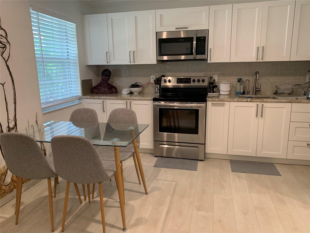 Photo of 801 SW 10th Street #2, Fort Lauderdale, FL 33315 (MLS # B26036053)