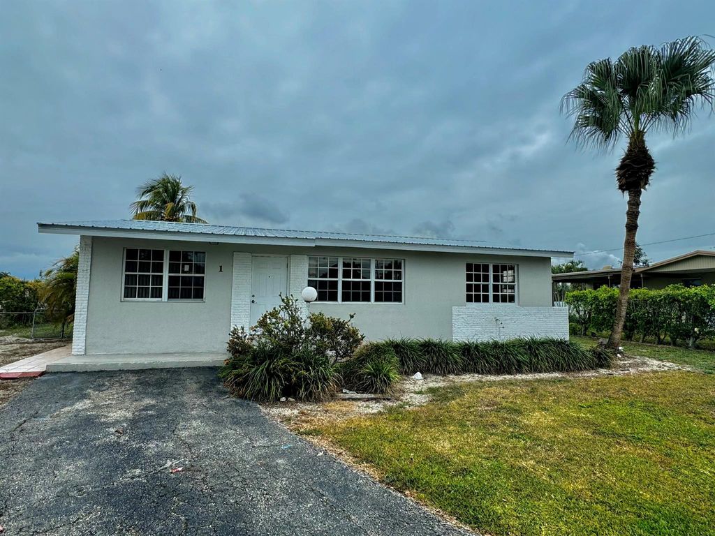 Photo of 1 NE I Avenue, Belle Glade, FL 33430 (MLS # R11053630)