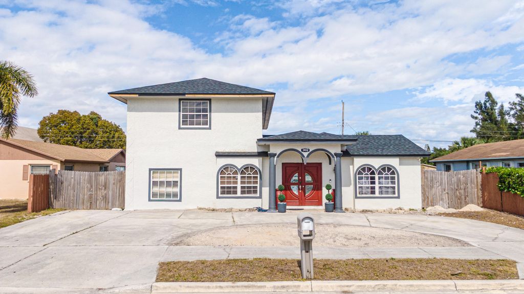 Photo of 1412 W 27th Street, Riviera Beach, FL 33404 (MLS # R11149799)