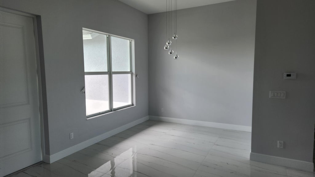 Photo of 5203 NW West Piper Circle, Port Saint Lucie, FL 34986 (MLS # R10973787)