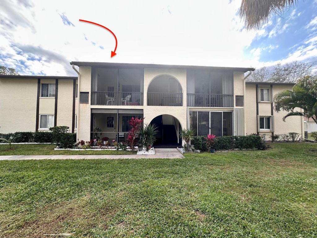 Photo of 5991 Whispering Pine Way #C-2, Greenacres, FL 33463 (MLS # R11158807)