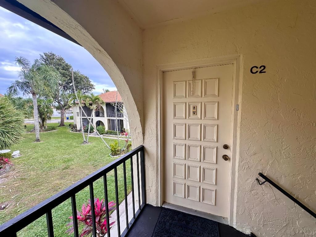 Photo of 5991 Whispering Pine Way #C-2, Greenacres, FL 33463 (MLS # R11158807)