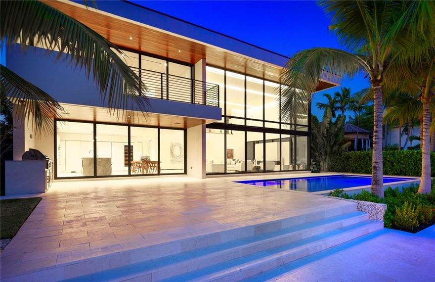 Just completed! New Las Olas Tropical Modern Residence in 7 Isles! Statement Architecture, Globally sourced materials, clean minimal lines with subtle textures adding warmth to the stunning design. Soaring 20ft high Great Room with sliding walls of glass. Exotic Woods, 4'x4' Italian Porcelain, Custom Cabinetry, bookmatched marble highlight the well thought out finishes. Elevator, Natural Gas, SmartHome, Sub-Zero, Wolf. 75' concrete dock, SE exposure, Security Patrolled 7 Isles. Minutes to Ocean by boat
