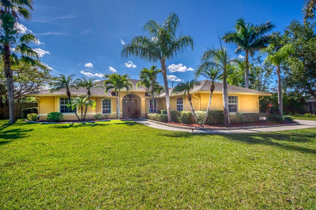 Photo of 214 NE Blairwood Trace, Jensen Beach, FL 34957 (MLS # R11076878)