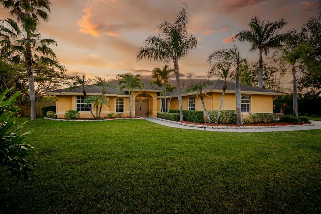 Photo of 214 NE Blairwood Trace, Jensen Beach, FL 34957 (MLS # R11076878)