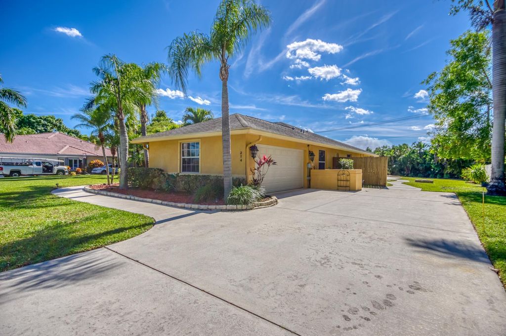 Photo of 214 NE Blairwood Trace, Jensen Beach, FL 34957 (MLS # R11076878)