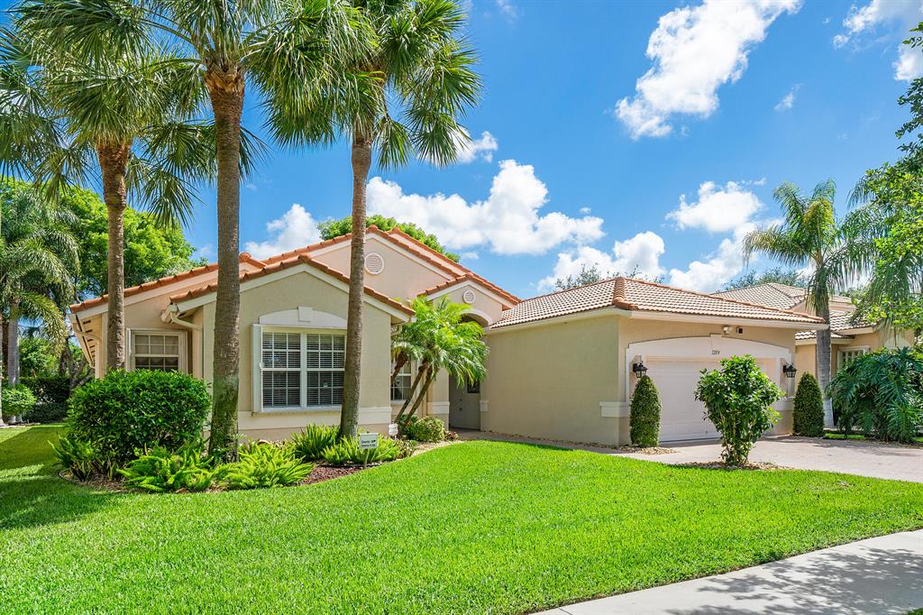One of the most sought after models, this Excalibur has been meticulously maintained; a hardly lived-in snowbird's home with a split floor plan (click on DOCUMENTS). Ceramic tile throughout. With separate living and family rooms it makes entertaining easy. Ceilings to 12'. The open kitchen has granite tops, lots of cabinets including a large double pantry. Instant hot, newer fridge, Bosch dishwasher. BR2 set up as a home office. Plenty of storage space. Back of house has a berm on a canal; no one behind you, a very private screened-in patio. Generator included There is so much to do in Avalon, it's like going to camp! Check out the amenities in DOCUMENTS. Publix center with 5 restaurants adjacent; private resident's gate. 15 minutes to downtown Delray's Atlantic Ave. FURNITURE AVAILABLE.